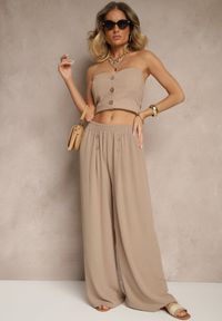 Renee - Beżowe Spodnie z Bawełną o Szerokim Kroju High Waist Ozdobione Guzikami Morritia. Okazja: na co dzień. Stan: podwyższony. Kolor: beżowy. Materiał: bawełna. Wzór: aplikacja. Styl: elegancki, casual