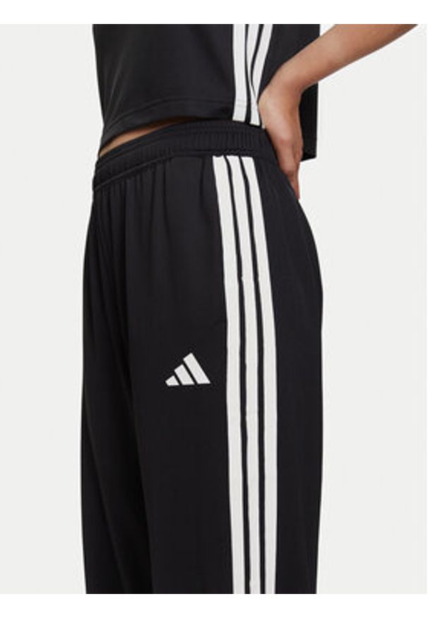 Adidas - adidas Spodnie dresowe Tiro Cut 3-Stripes Mesh JG4103 Czarny Loose Fit. Kolor: czarny. Materiał: syntetyk