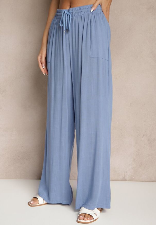 Renee - Niebieskie Szerokie Spodnie z Bawełną na Gumce z Kieszeniami Efridessa. Okazja: na co dzień. Stan: podwyższony. Kolor: niebieski. Materiał: bawełna. Styl: klasyczny, casual