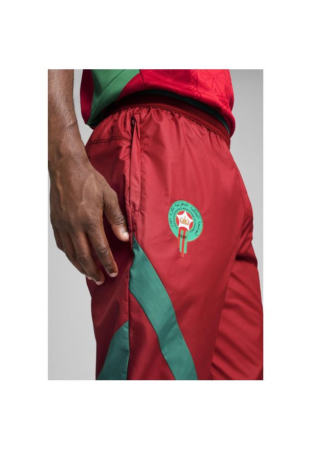 Puma - Męskie tkane spodnie przedmeczowe Maroko PUMA Intense Red Archive Green. Kolor: czerwony, wielokolorowy, zielony