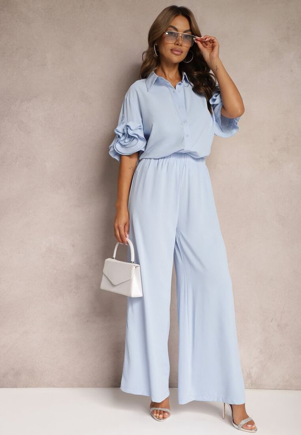 Renee - Niebieski Komplet Szerokie Spodnie i Koszula z Falbanami Rivathins. Kolor: niebieski