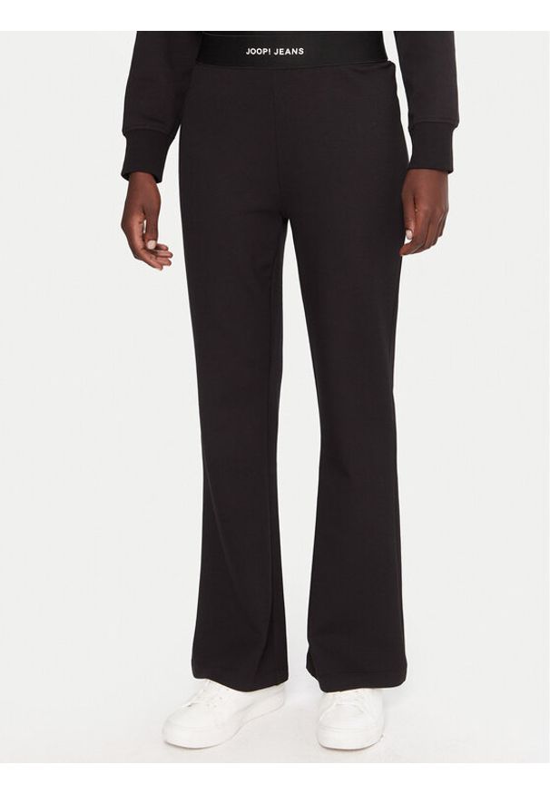 JOOP! Jeans Spodnie dresowe Tuvana 30048514 Czarny Relaxed Fit. Kolor: czarny. Materiał: bawełna