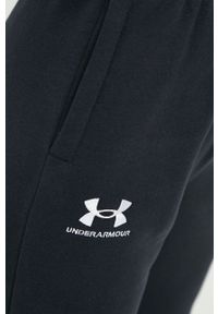 Under Armour spodnie dresowe damskie kolor czarny gładkie. Stan: podwyższony. Kolor: czarny. Materiał: dresówka. Wzór: gładki #4