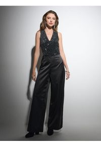 Sinsay - Kombinezon z cekinami - czarny. Kolor: czarny #1