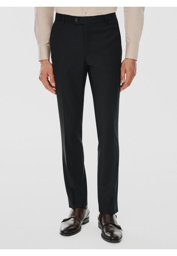 Pako Lorente - PAKO LORENTE – Spodnie garniturowe w kolorze czarnym. Okazja: na spotkanie biznesowe. Kolor: czarny. Materiał: poliester, wiskoza, elastan. Styl: biznesowy, elegancki