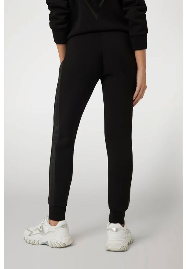 Guess - GUESS Czarne damskie dresowe spodnie Allie Scuba. Kolor: czarny. Materiał: dresówka