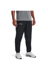 Spodnie dresowe męskie Under Armour Rush Woven Pants. Kolor: czarny. Materiał: dresówka