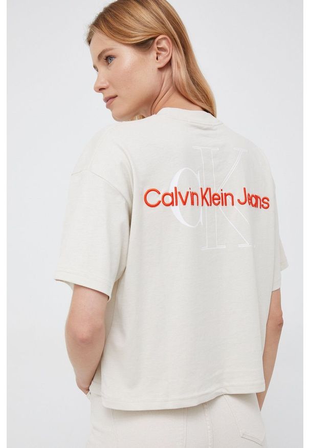 Calvin Klein Jeans t-shirt bawełniany kolor beżowy. Kolor: beżowy. Materiał: bawełna. Wzór: aplikacja