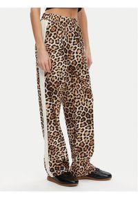 Puma Spodnie dresowe T7 Leo Luxe 632343 Brązowy Straight Fit. Kolor: brązowy. Materiał: syntetyk #1