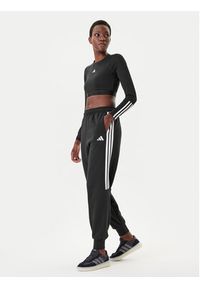 Adidas - adidas Spodnie dresowe Tiro 3-Stripes JL7488 Czarny Loose Fit. Kolor: czarny. Materiał: syntetyk #3