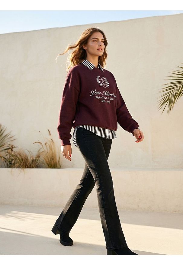 Sinsay - Spodnie jeansowe flare - czarny. Kolor: czarny