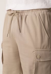 Born2be - Beżowe Szorty z Bawełną w Stylu Safari z Kieszeniami Cargo Sabririla. Okazja: na co dzień. Kolor: beżowy. Materiał: bawełna. Długość: długie. Sezon: lato. Styl: casual #3