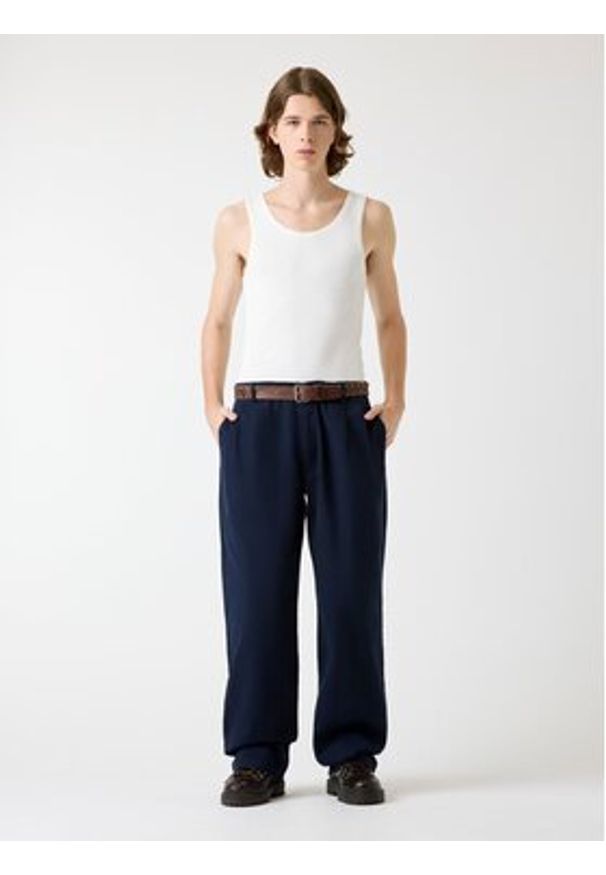 Guess Jeans Spodnie materiałowe 180376 Niebieski Regular Fit. Kolor: niebieski. Materiał: materiał