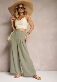 Renee - Ciemnozielone Spodnie w Stylu Alladynek High Waist Wykończone Gumką w Pasie Riselma. Okazja: na co dzień. Stan: podwyższony. Kolor: zielony. Styl: sportowy, casual