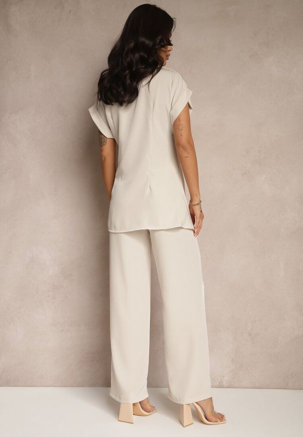 Renee - Beżowy Komplet ze Spodniami o Szerokim Kroju i Koszulą z Ozdobnym Wiązaniem Filaniella. Kolor: beżowy