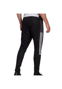 Adidas - Spodnie męskie adidas Tiro 21 Track Pants. Kolor: wielokolorowy, biały, czarny