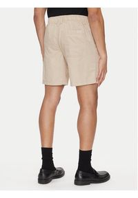 Calvin Klein Jeans Szorty materiałowe J30J327300 Beżowy Regular Fit. Kolor: beżowy. Materiał: bawełna