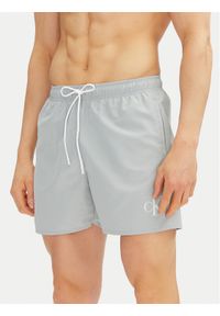 Calvin Klein Swimwear Szorty kąpielowe KM0KM01101 Niebieski Regular Fit. Kolor: niebieski. Materiał: syntetyk