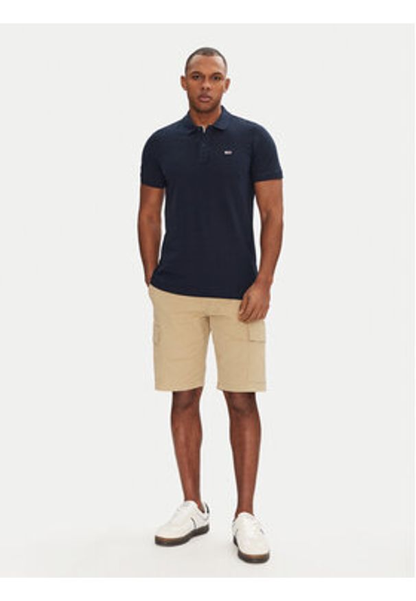 Tommy Jeans Polo DM0DM20676 Granatowy Slim Fit. Typ kołnierza: polo. Kolor: niebieski. Materiał: bawełna