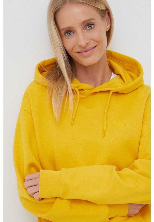 Jack Wolfskin bluza bawełniana damska kolor żółty z kapturem gładka. Typ kołnierza: kaptur. Kolor: żółty. Materiał: bawełna. Wzór: gładki