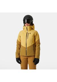 Damska kurtka narciarska Helly Hansen Alphelia. Kolor: żółty, beżowy, wielokolorowy. Sezon: zima. Sport: narciarstwo #1