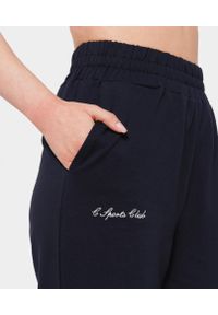 Szerokie spodnie dresowe dla kobiet Carpatree Sports Club. Kolor: niebieski. Materiał: dresówka