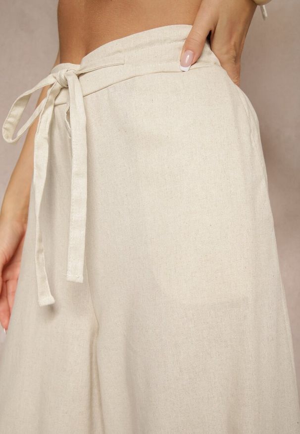 Renee - Beżowe Bawełniane Spodnie o Szerokim Kroju High Waist Ściągane Troczkiem Virselia. Okazja: na co dzień. Stan: podwyższony. Kolor: beżowy. Materiał: bawełna. Styl: sportowy, elegancki, casual