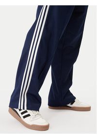 Adidas - adidas Spodnie dresowe adicolor KE3496 Granatowy Loose Fit. Kolor: niebieski. Materiał: bawełna #5