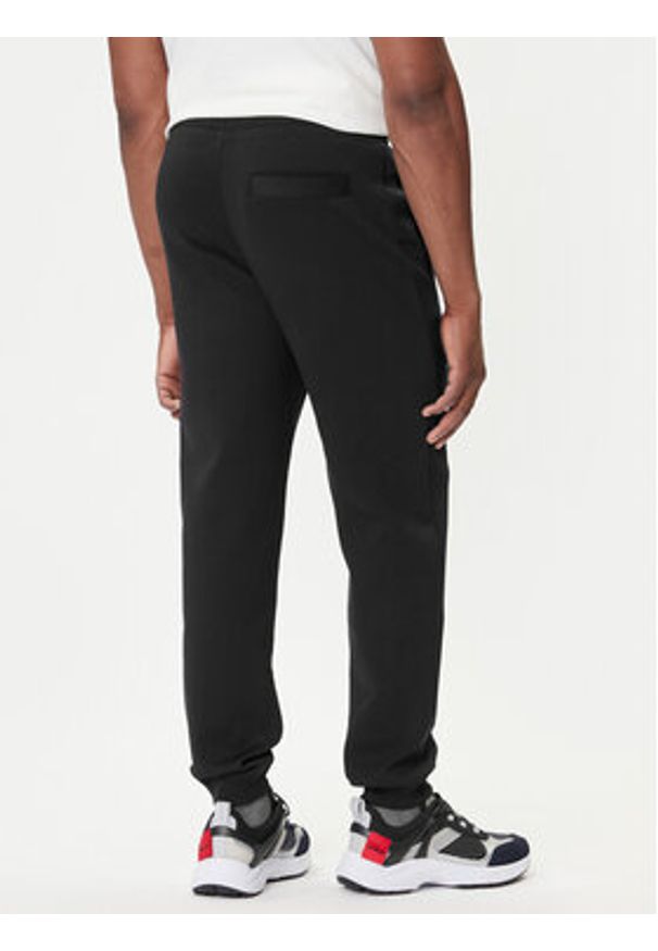 Hugo - HUGO Spodnie dresowe Dimacs 50533695 Czarny Relaxed Fit. Kolor: czarny. Materiał: bawełna