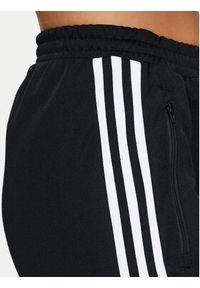 Adidas - adidas Spodnie dresowe Beckenbauer IW3171 Czarny Regular Fit. Kolor: czarny. Materiał: bawełna, syntetyk