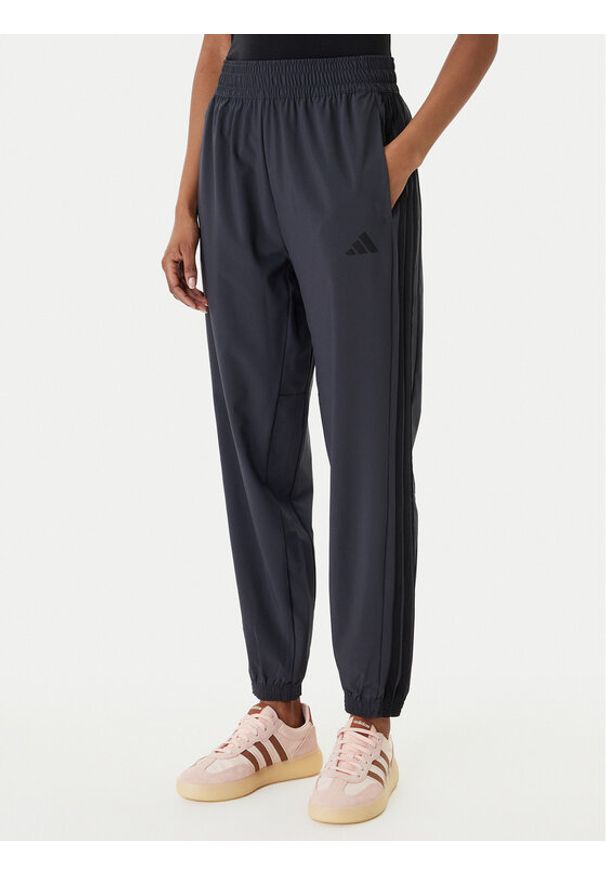 Adidas - adidas Spodnie dresowe Train Essentials 3-Stripes Woven KC5496 Czarny Regular Fit. Kolor: czarny. Materiał: syntetyk