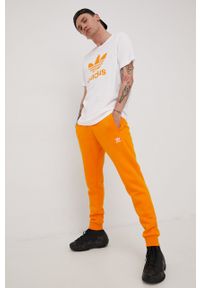 adidas Originals spodnie dresowe HG3902 męskie kolor pomarańczowy gładkie. Kolor: pomarańczowy. Materiał: dresówka. Wzór: gładki #4
