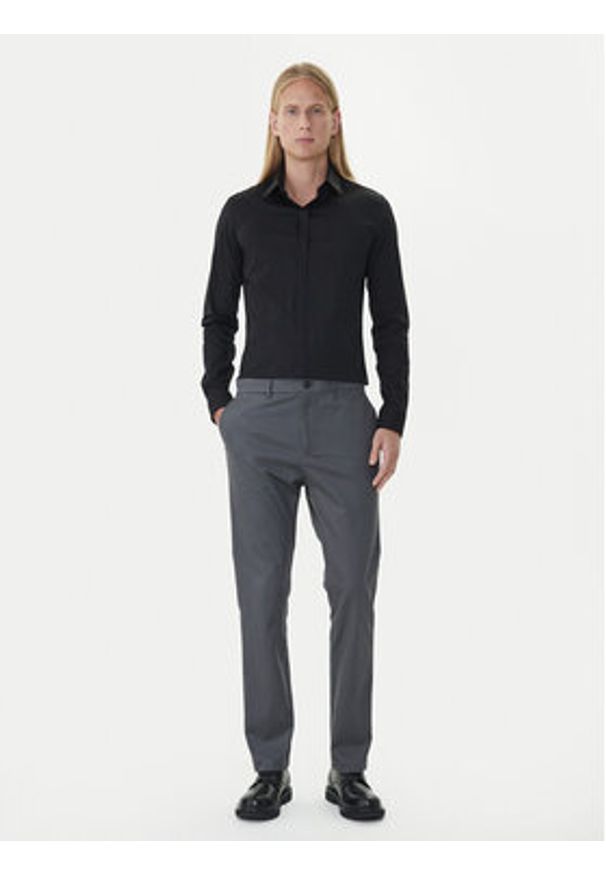 Calvin Klein Chinosy LV04LD613G Szary Slim Fit. Kolor: szary. Materiał: bawełna