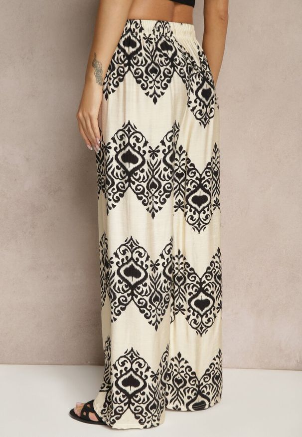 Renee - Czarne Spodnie z Wiskozy o Szerokim Kroju High Waist ze Wzorem Boho Neolissea. Okazja: na co dzień, na spacer. Stan: podwyższony. Kolor: czarny. Materiał: wiskoza. Sezon: lato. Styl: boho