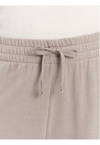 Under Armour Spodnie dresowe Ua Rival 1382735 Beżowy Loose Fit. Kolor: beżowy. Materiał: bawełna #3