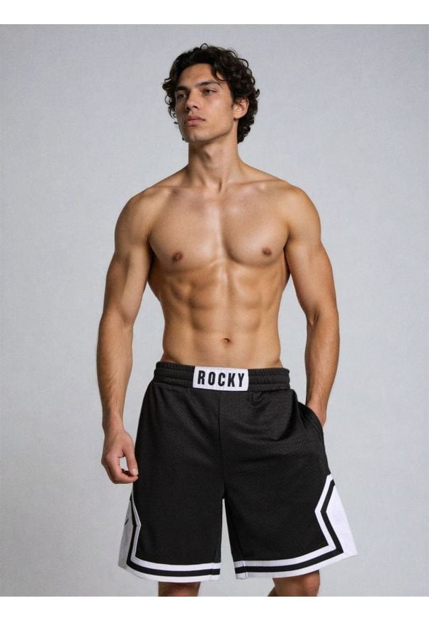 Sinsay - Szorty sportowe Rocky Balboa - czarny. Kolor: czarny. Styl: sportowy