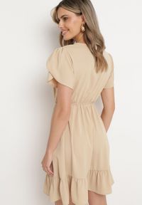 Born2be - Beżowa Rozkloszowana Sukienka z Gumką w Talii i Falbanką Welimia. Kolor: beżowy #3