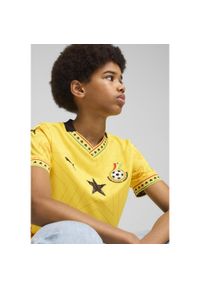 Puma - Młodzieżowa koszulka wyjazdowa Ghana 2025 PUMA Pelé Yellow Black. Kolor: żółty. Wzór: aplikacja. Sport: piłka nożna