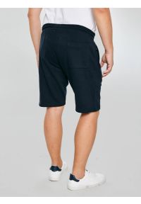 Big-Star - Szorty męskie dresowe wiązane w pasie granatowe Kersyner 403. Okazja: na co dzień. Kolor: niebieski. Materiał: dresówka. Wzór: haft. Styl: casual, sportowy