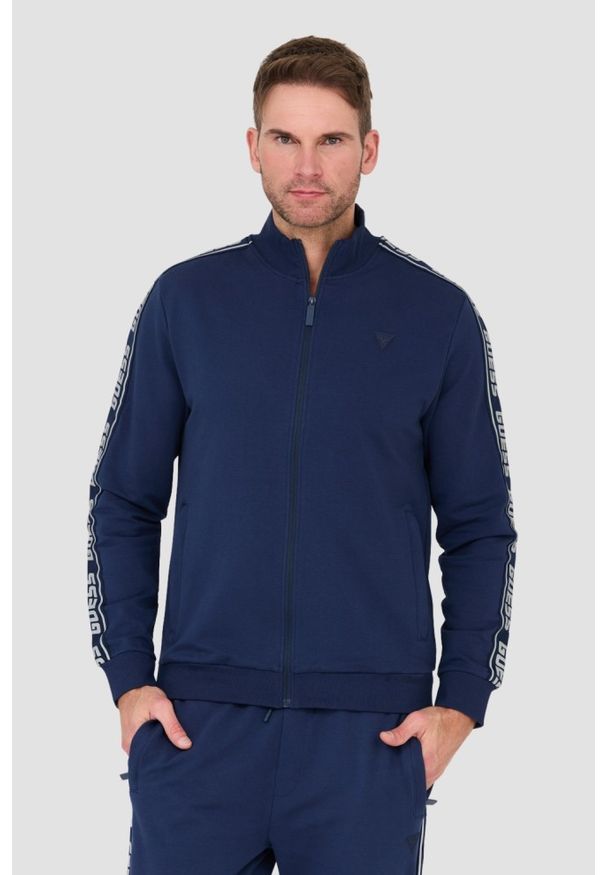 Guess - GUESS Granatowa męska bluza dresowa, Rozmiar XXL. Typ kołnierza: bez kaptura. Kolor: niebieski. Materiał: dresówka