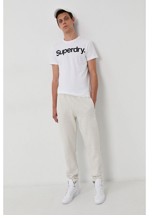 Superdry Spodnie męskie kolor szary gładkie. Kolor: szary. Materiał: dzianina. Wzór: gładki