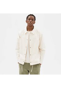 Kurtka New Balance MJ23552GIE – biała. Okazja: na co dzień. Kolor: biały. Materiał: bawełna, materiał. Styl: klasyczny, casual #1