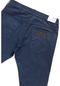 Wrangler - WRANGLER SPODNIE MĘSKIE GREENSBORO NAVY W15QGE114. Materiał: materiał #6