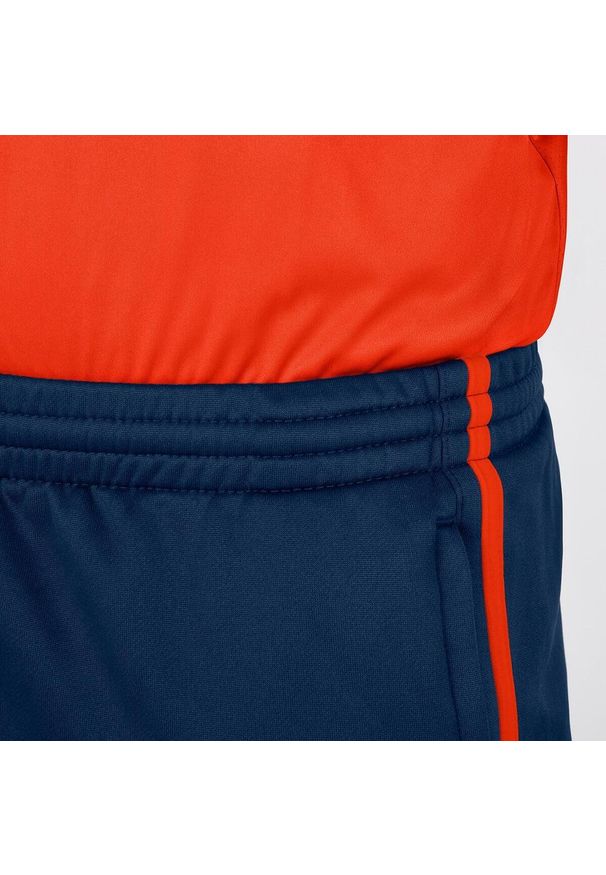Spodnie dziecięce Jako d'entraînement Active. Kolor: wielokolorowy, niebieski, czerwony, pomarańczowy. Sport: piłka nożna