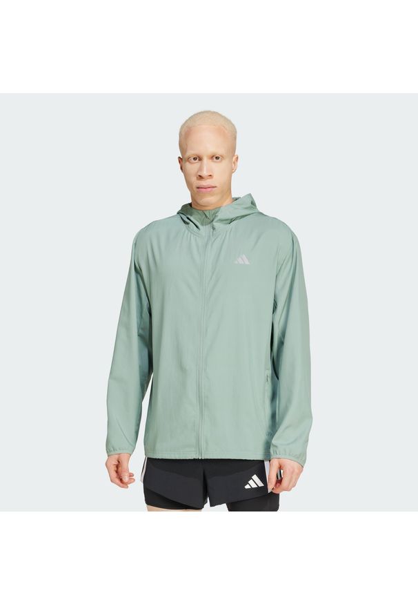Adidas - Kurtka Run It. Kolor: zielony. Sport: bieganie