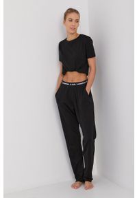 Karl Lagerfeld Spodnie piżamowe damskie kolor czarny. Kolor: czarny. Materiał: bawełna, materiał, dzianina, lyocell, tkanina, jedwab. Wzór: melanż #4