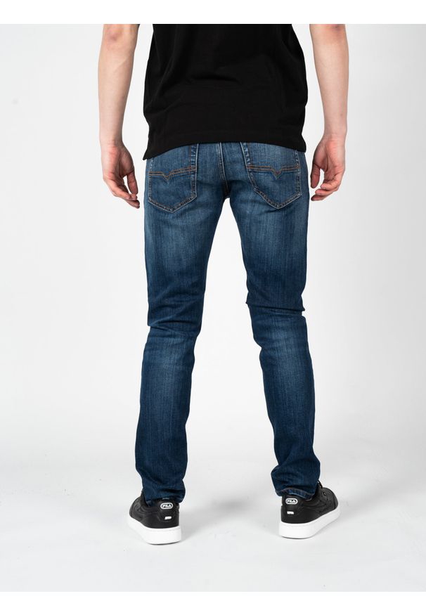 Diesel Jeansy "Tepphar-X" | 00SWID-RM062-01 | Mężczyzna | Granatowy. Stan: obniżony. Kolor: niebieski. Wzór: aplikacja. Styl: elegancki, klasyczny