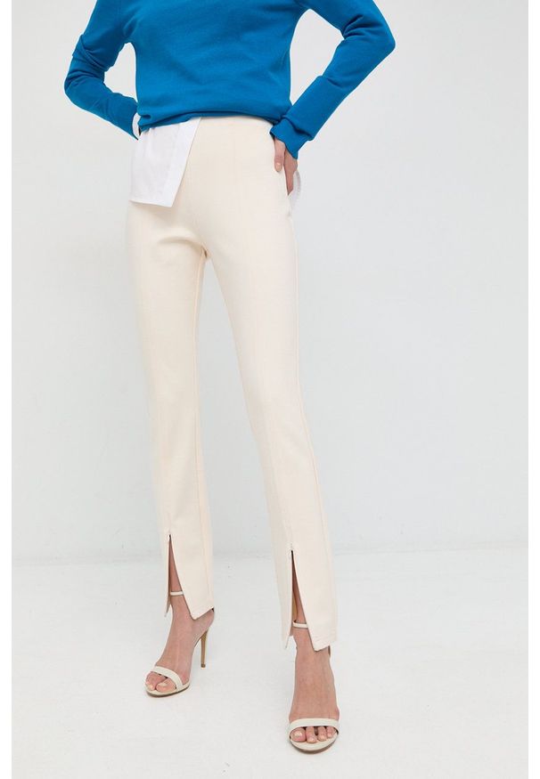 IVY & OAK - Ivy Oak Spodnie damskie kolor kremowy proste high waist. Okazja: na co dzień. Stan: podwyższony. Kolor: beżowy. Materiał: materiał. Styl: casual