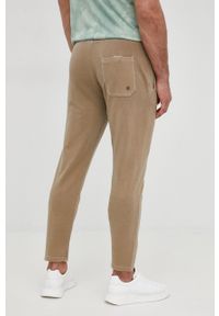 MANUEL RITZ - Manuel Ritz spodnie dresowe męskie kolor beżowy z nadrukiem. Kolor: beżowy. Materiał: dresówka. Wzór: nadruk #3