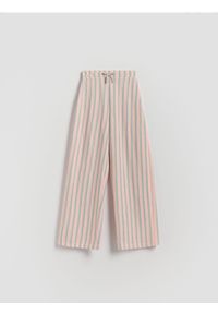 Reserved - Spodnie w paski - wielobarwny. Materiał: dzianina, bawełna, wiskoza. Wzór: paski #1